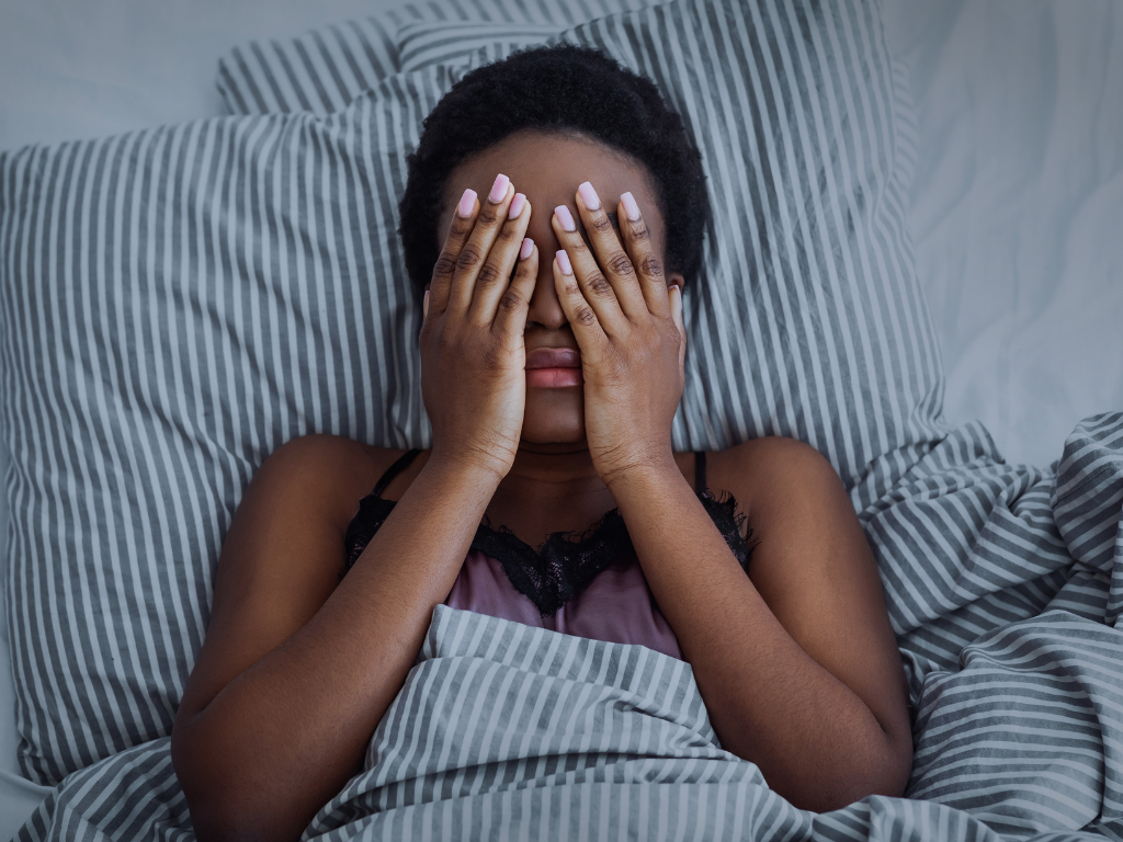 ethnic woman suffering from insomnia